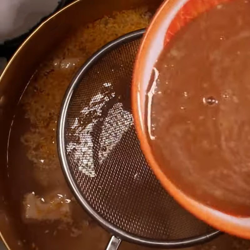 Step 4 Cook the broth for Mắm Ruốc Hotpot