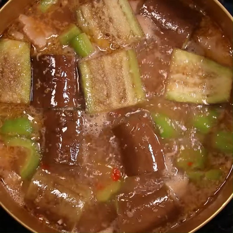 Step 4 Cook the broth for Mắm Ruốc Hotpot