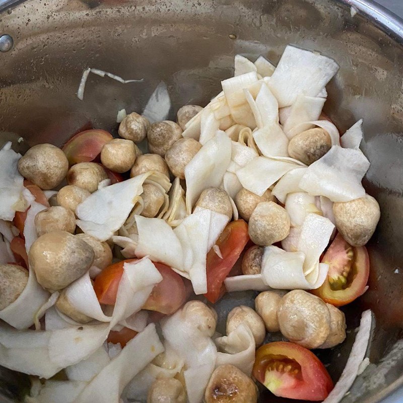 Step 4 Cook the broth Frog hotpot with giang leaves