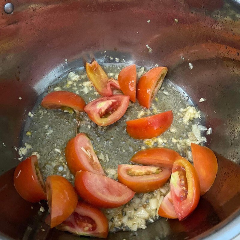 Step 4 Cook the broth Frog hotpot with giang leaves