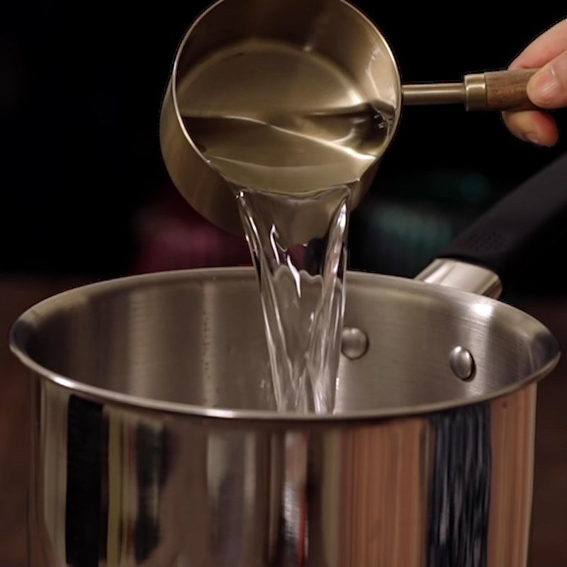 Step 1 Cook sugar water for Rose syrup with rose essential oil