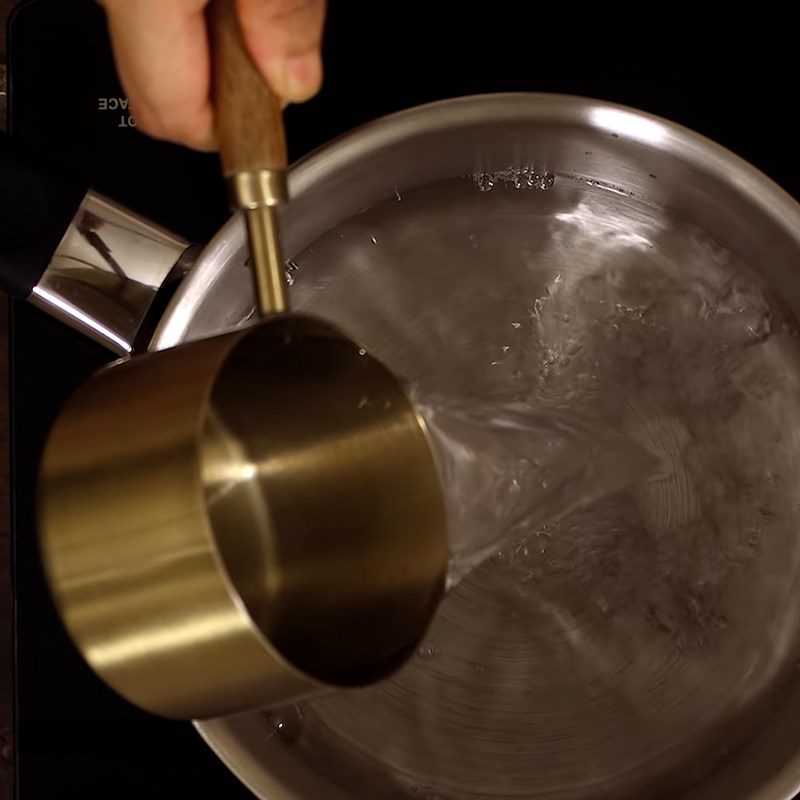 Step 1 Cook sugar water for Rose syrup with rose essential oil