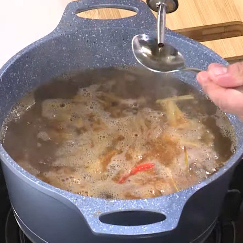 Step 4 Cooking the hot pot broth Sour spicy pork rib hot pot