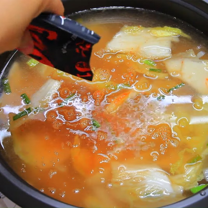 Step 2 Cooking the broth for Korean seafood kimchi hotpot