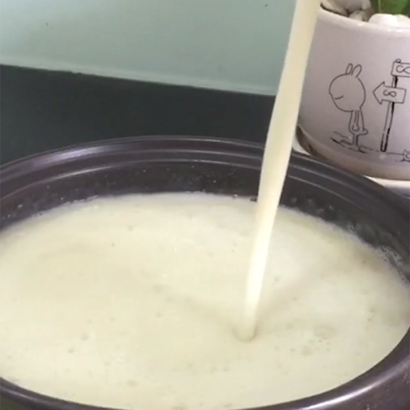 Step 4 Cook the milk Lotus seed taro milk for baby weaning