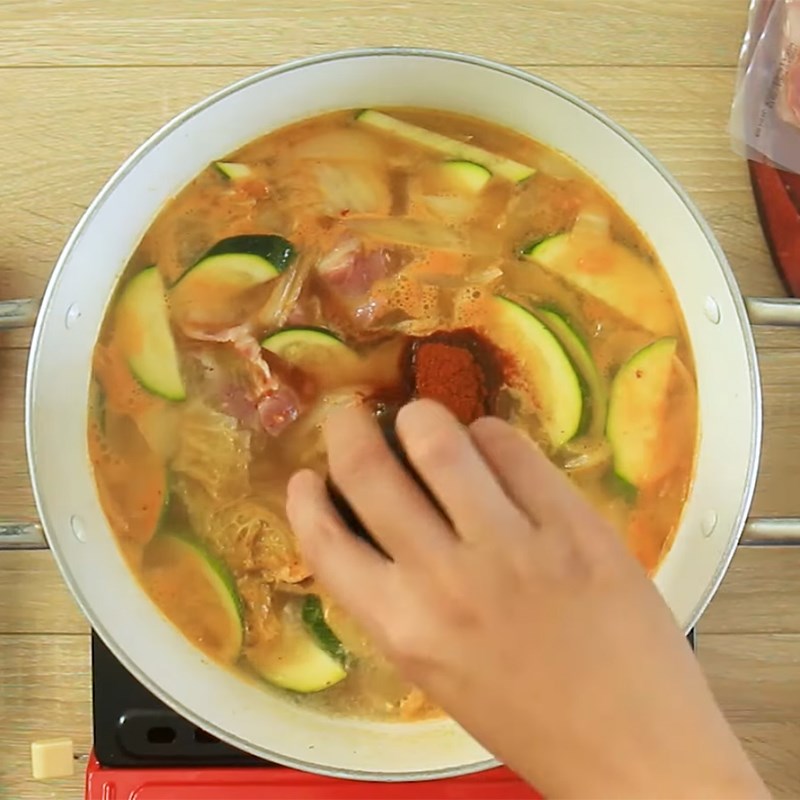 Step 4 Season and finish Kimchi sausage hot pot