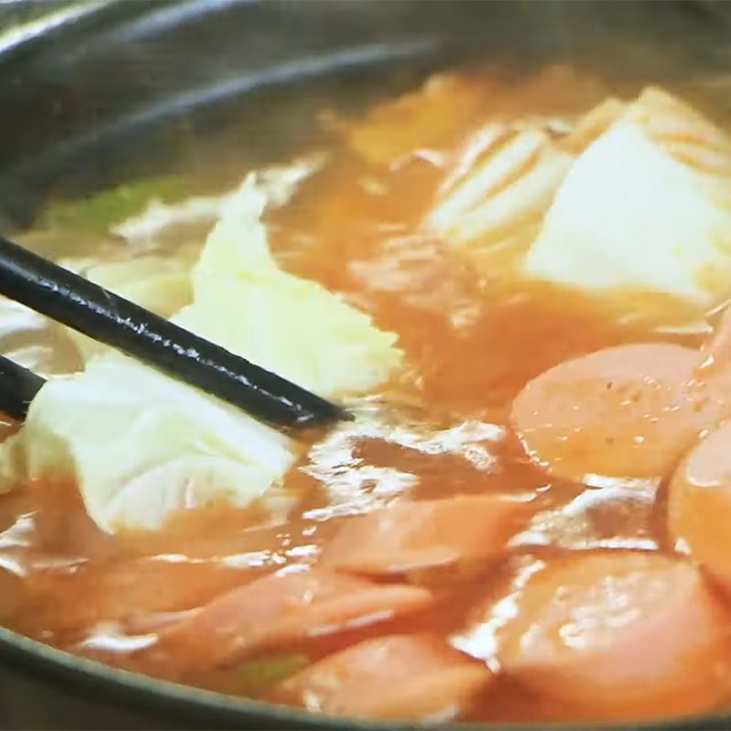 Step 4 Season and finish Kimchi sausage hot pot