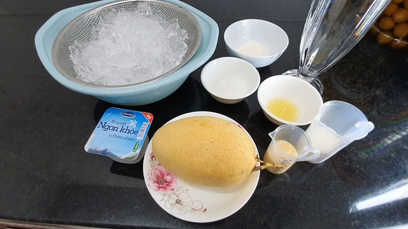 Ingredients for mango mixed with yogurt