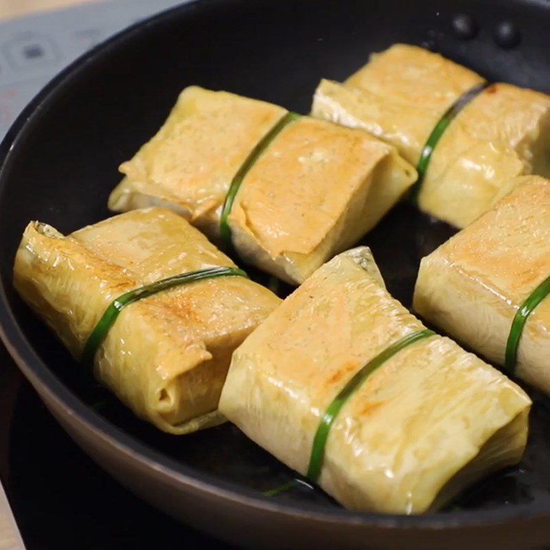 Step 3 Stuff the mushroom filling and wrap it in tofu skin Tofu with mushroom filling braised in coconut water