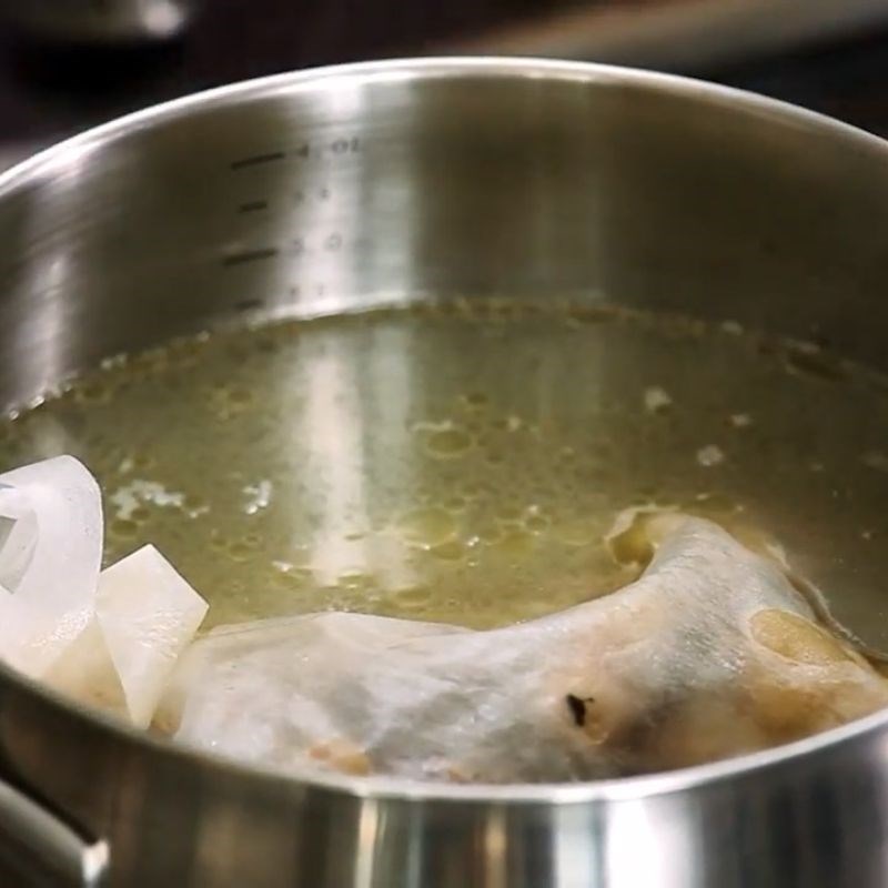 Step 3 Simmer the chicken broth Korean-style Chicken Noodles