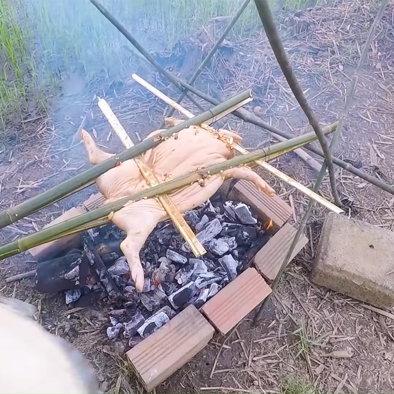 Step 4 Grilling the pork Whole roasted pig