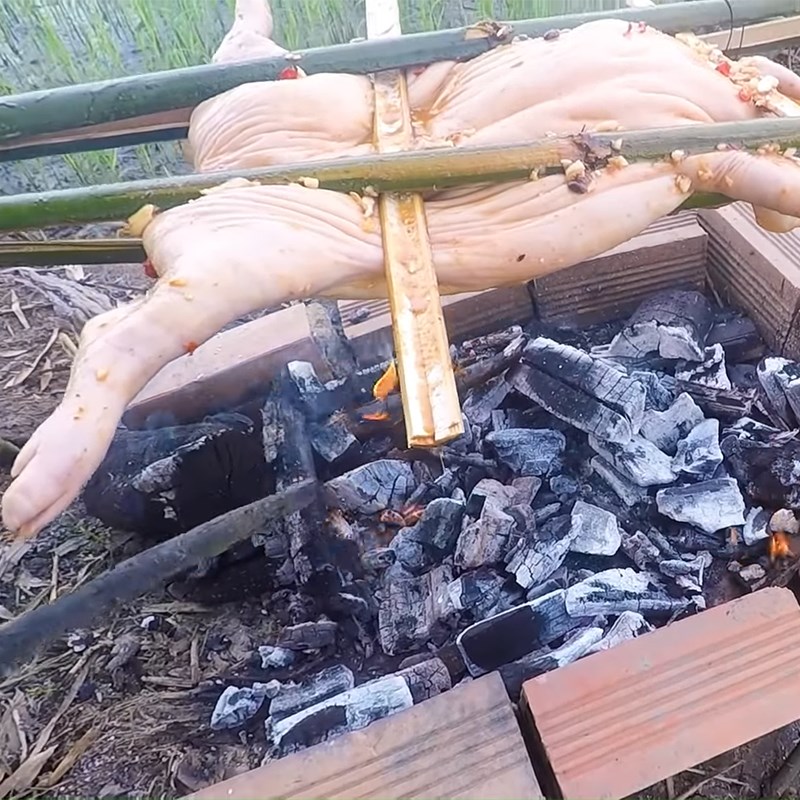 Step 4 Grilling the pork Whole roasted pig