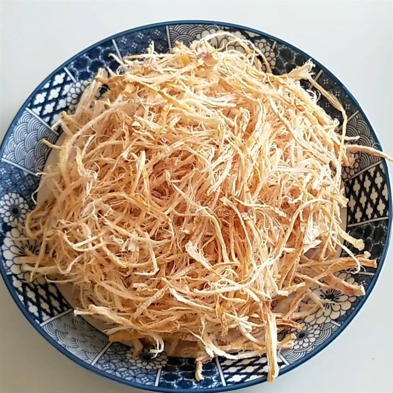 Step 1 Grill and tear the dried squid Stir-fried Dried Squid with Vermicelli