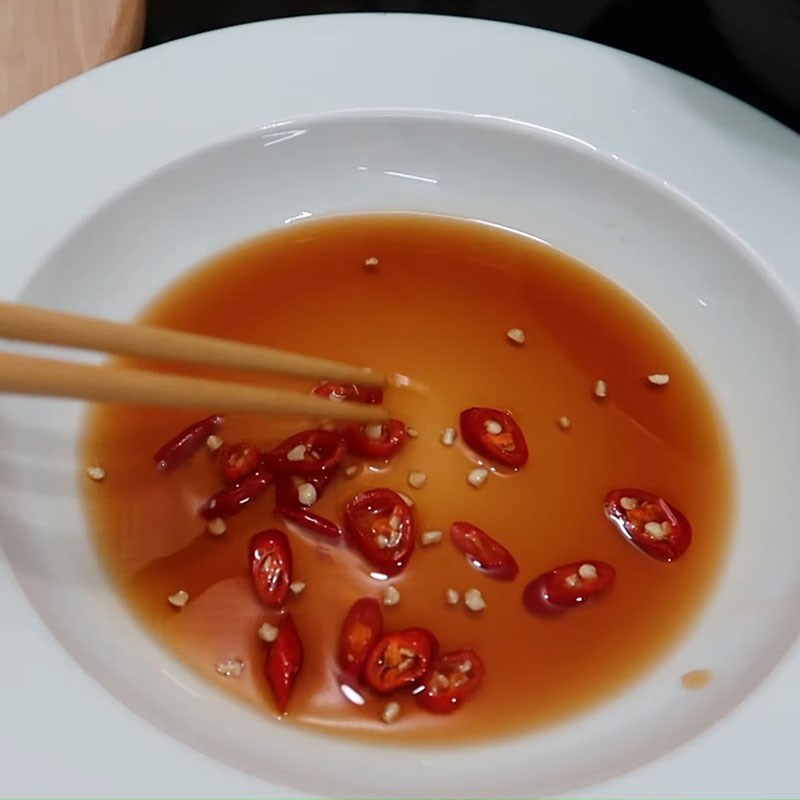 Step 4 Prepare the dipping sauce and blanch the noodles Seafood Mushroom Hotpot
