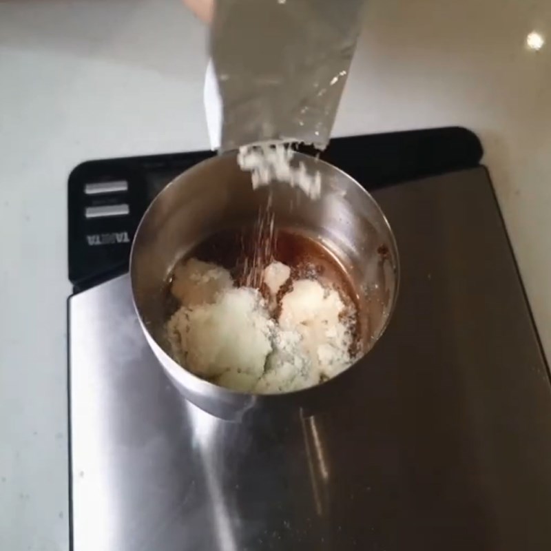 Step 1 Brew tea with milk powder for Mango Matcha Milk Tea with Black Tapioca Pearls