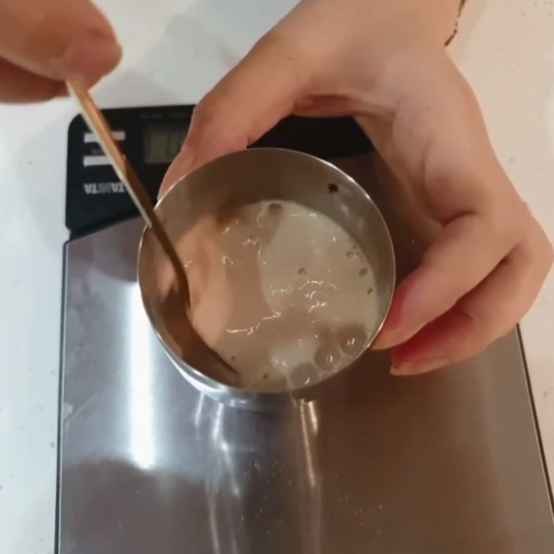 Step 1 Brew tea with milk powder for Mango Matcha Milk Tea with Black Tapioca Pearls