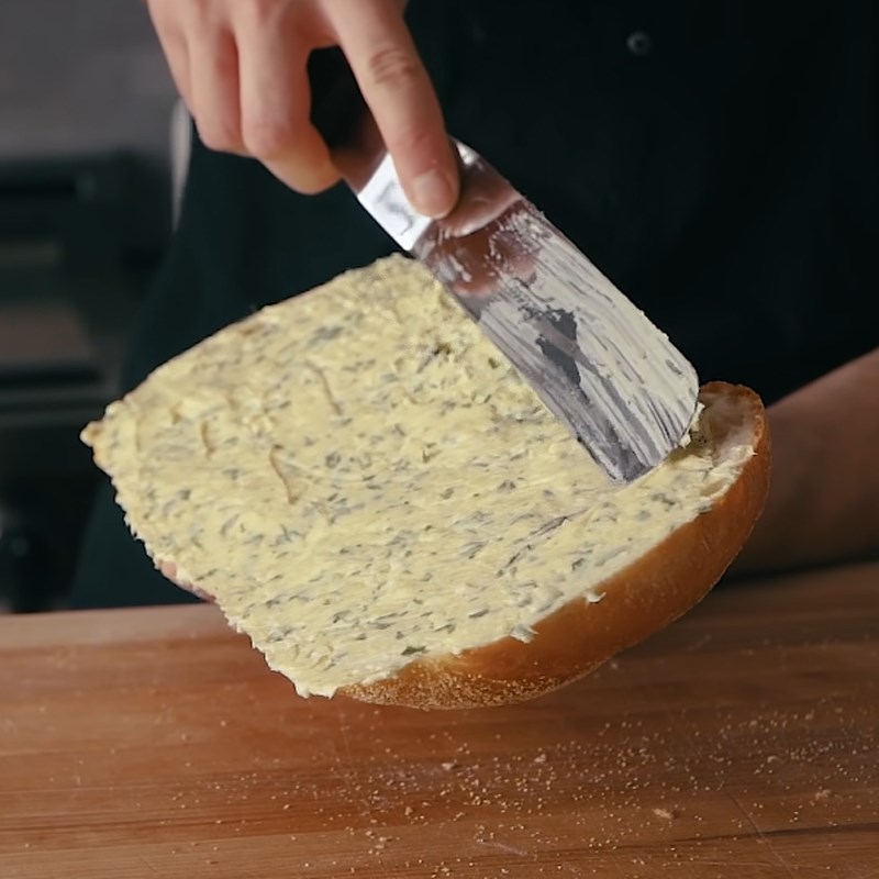 Step 4 Spread butter and toast the bread Caesar salad garlic butter bread