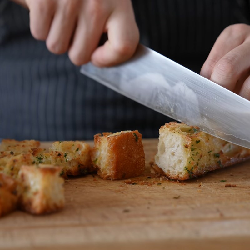 Step 4 Spread butter and toast the bread Caesar salad garlic butter bread