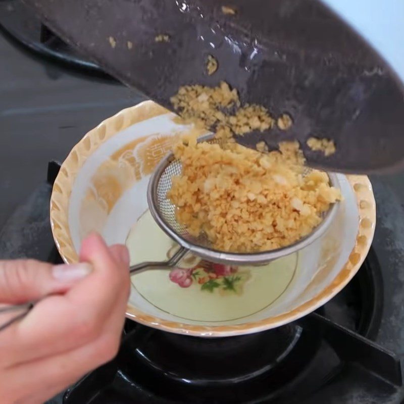 Step 2 Sauté garlic and prepare annatto oil for dried chicken using the oven