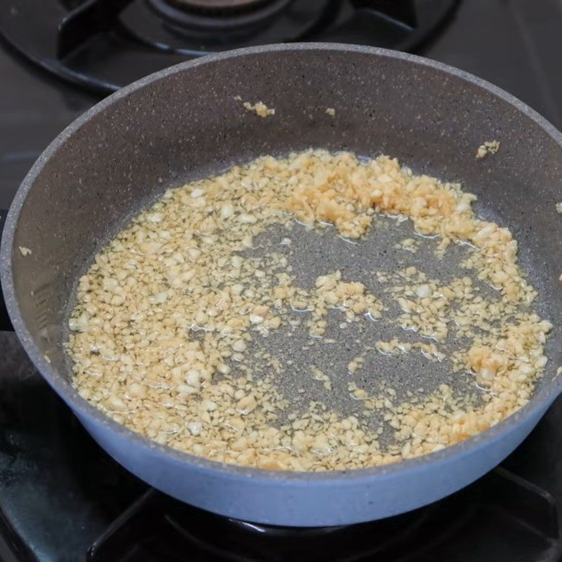 Step 2 Sauté garlic and prepare annatto oil for dried chicken using the oven