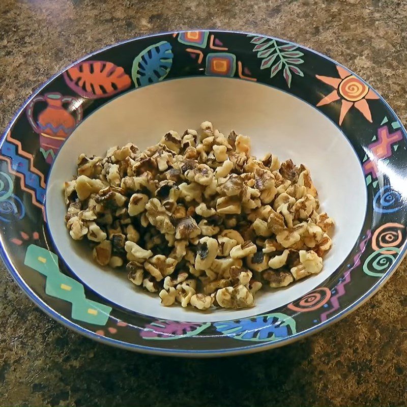 Step 1 Toast walnuts for American-style Apple Salad (Waldorf salad)