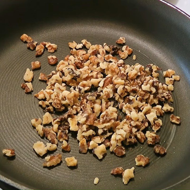 Step 1 Toast walnuts for American-style Apple Salad (Waldorf salad)