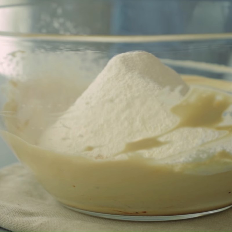 Step 2 Sifting and mixing flour for Tiramisu dalgona candy