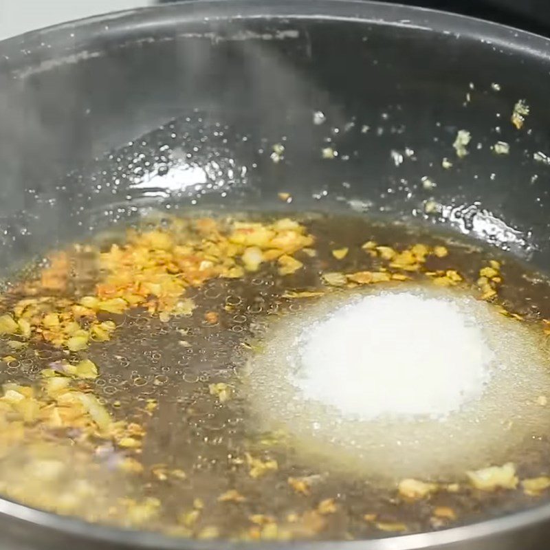Step 3 Glaze quail eggs Quail eggs glazed with garlic butter