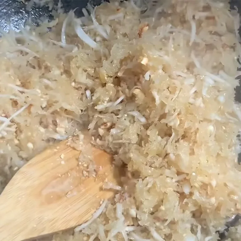 Step 4 Cook the filling for coconut-filled cakes