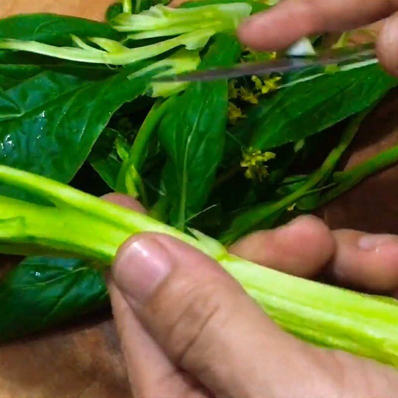 Step 2 Prepare the mustard greens Chicken liver porridge with mustard greens