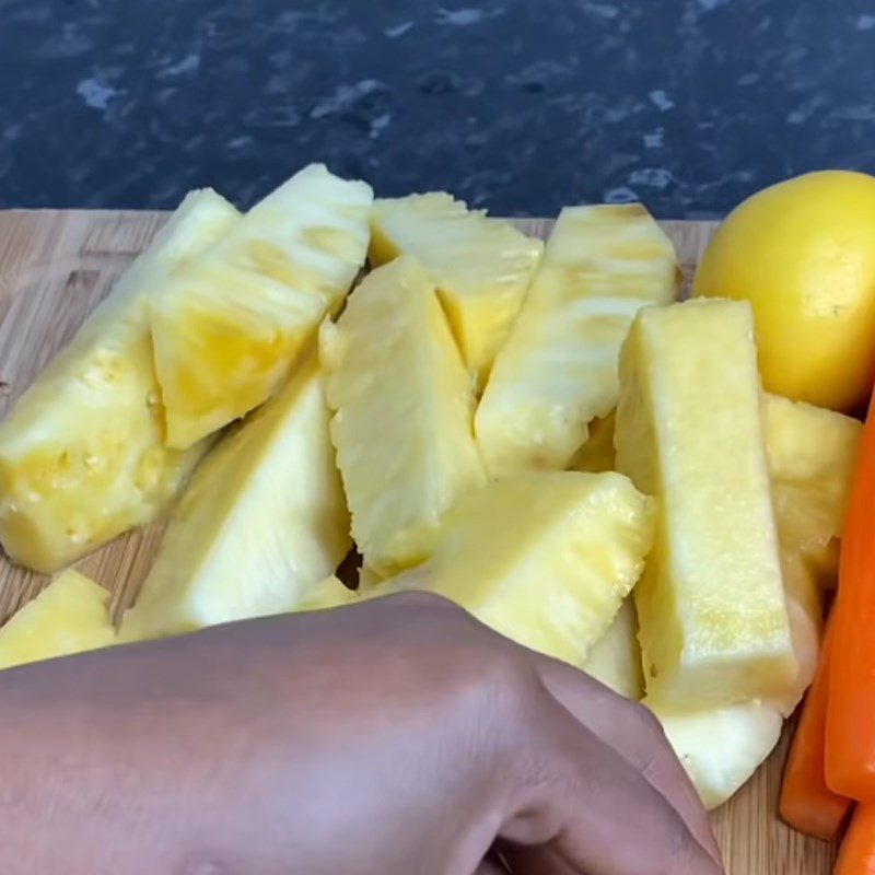 Step 1 Prepare pineapple and carrots for Pineapple Carrot Juice