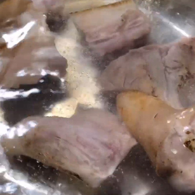 Step 1 Prepare the Pork Tail Braised Pork Tail with Traditional Herbs