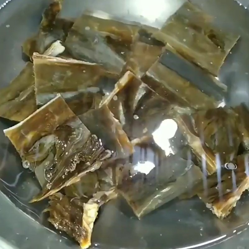 Step 1 Prepare dried stingray Dried stingray cooked with sour soup and water spinach