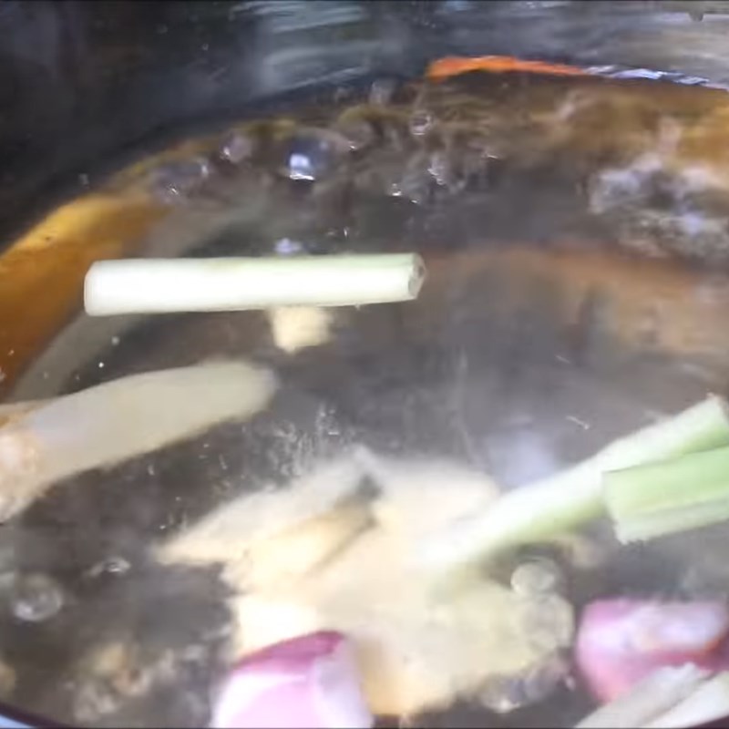 Step 2 Prepare and boil pig ears for Thai-style pig ears