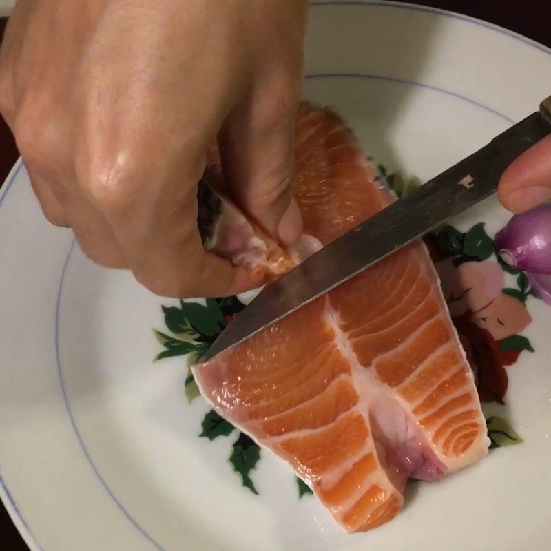 Step 1 Prepare and boil the fish for Salmon porridge with spinach