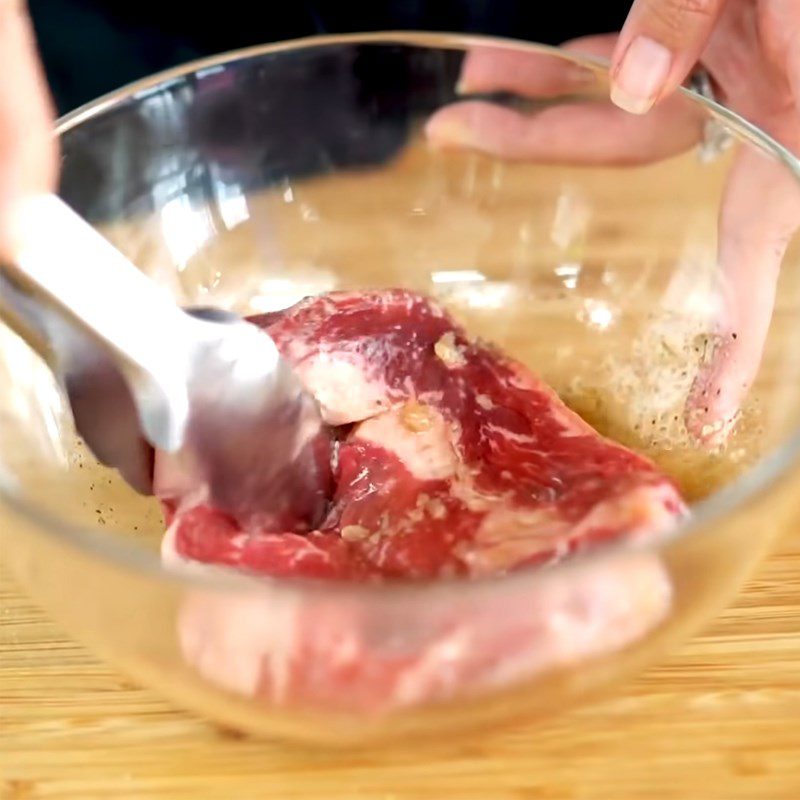 Step 1 Prepare and marinate the beef for Thai-style beef salad