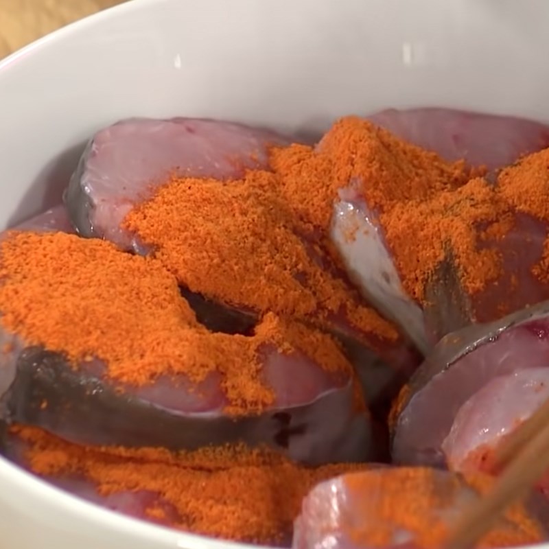 Step 1 Prepare and marinate fish for Fish Hotpot with flower buds
