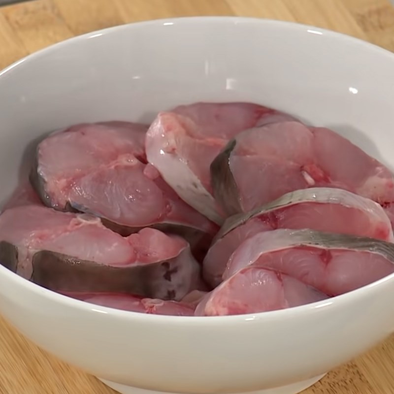 Step 1 Prepare and marinate fish for Fish Hotpot with flower buds