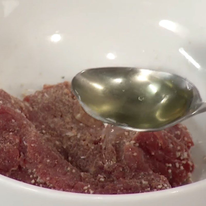 Step 1 Prepare and marinate the beef for Bitter Vegetable Beef Salad
