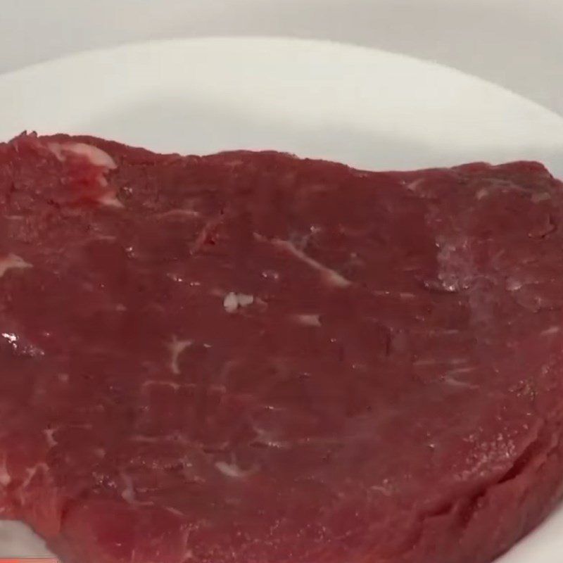 Step 1 Prepare and marinate the beef for Bitter Vegetable Beef Salad