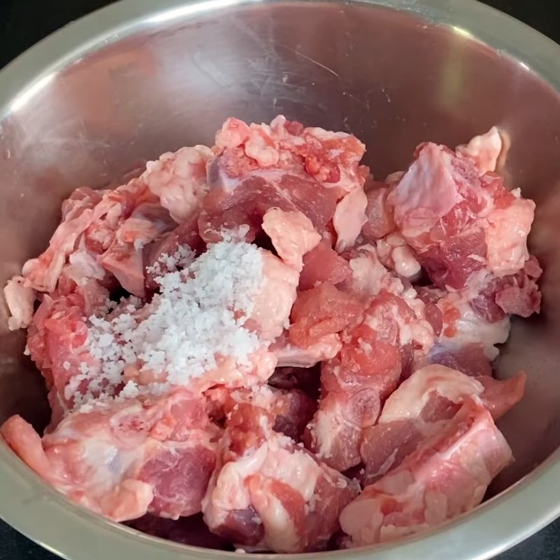 Step 1 Prepare bones and pork ribs for Satay Pork Intestine Noodles