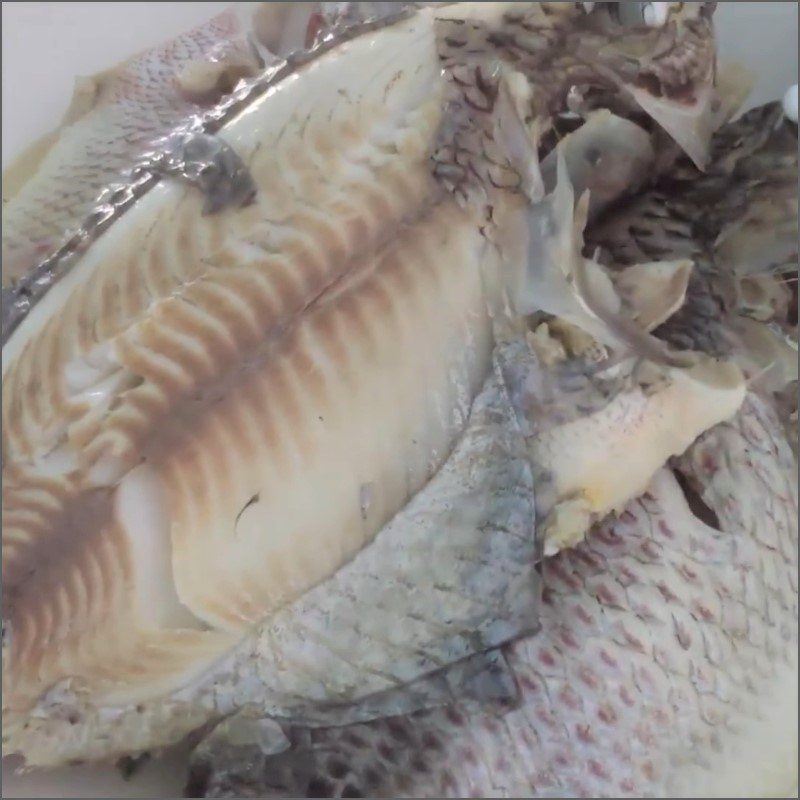 Step 3 Separate the fish meat Catfish noodle soup with mustard greens
