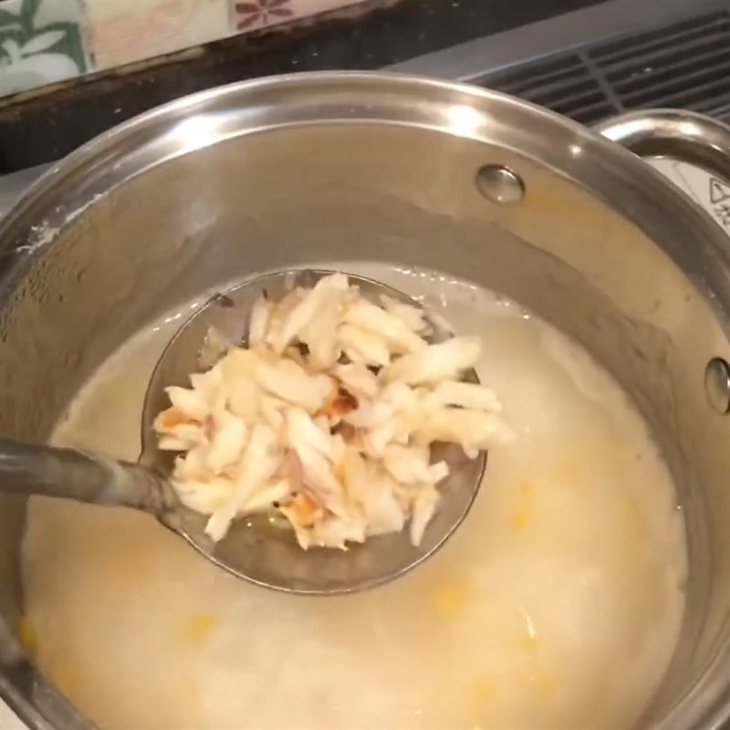 Step 5 Cook crab carrot porridge