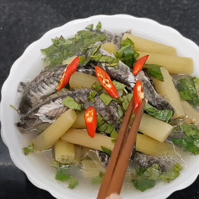 Step 4 Final product Sour eel soup with lotus flowers