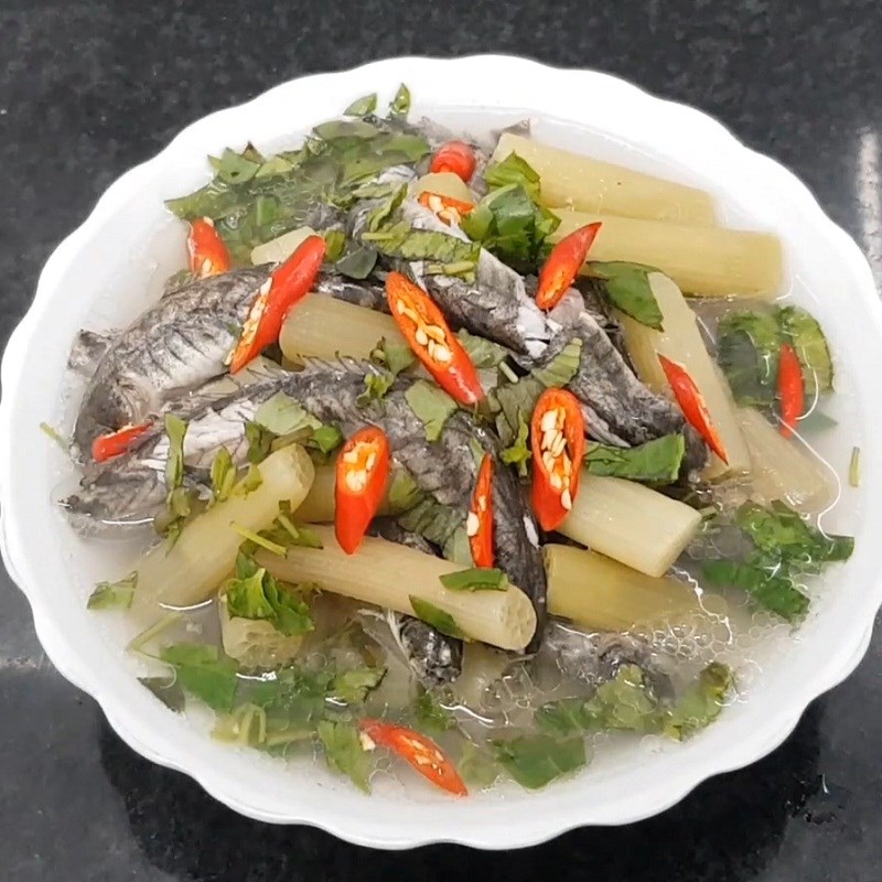 Step 4 Final product Sour eel soup with lotus flowers