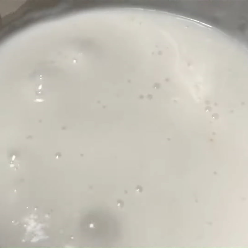 Step 4 Cook coconut milk for black bean dessert with tapioca starch