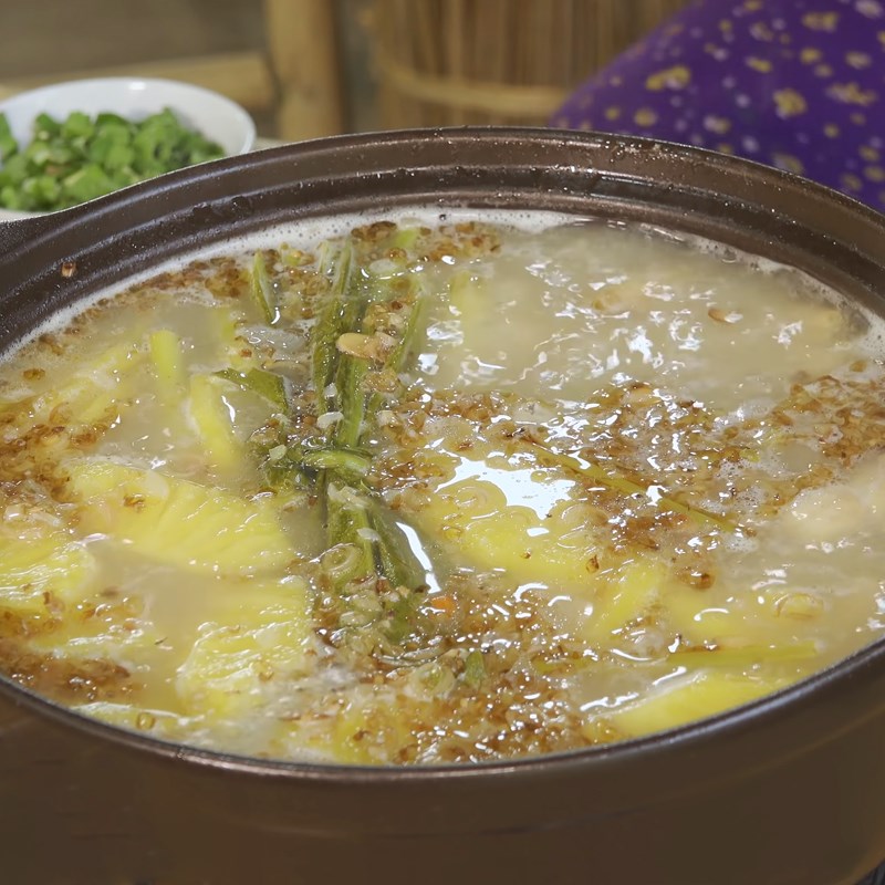 Step 5 Finished product Frog hot pot with fermented rice