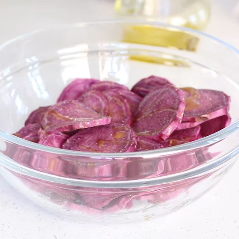 Step 2 Mix sweet potatoes with oil Purple Sweet Potato Chips using an Air Fryer
