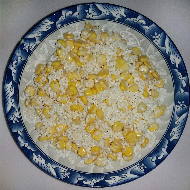 Step 2 Mix corn into sticky rice American corn sticky rice and glutinous corn