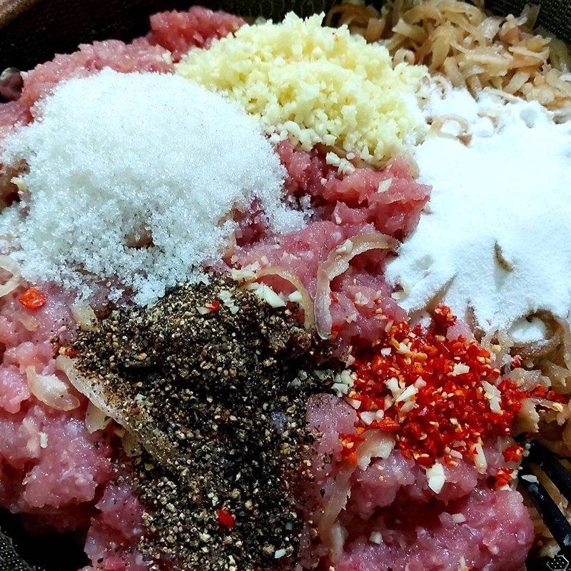 Step 4 Mixing sour pork seasoning for Thanh Hoa sour pork without banana leaves